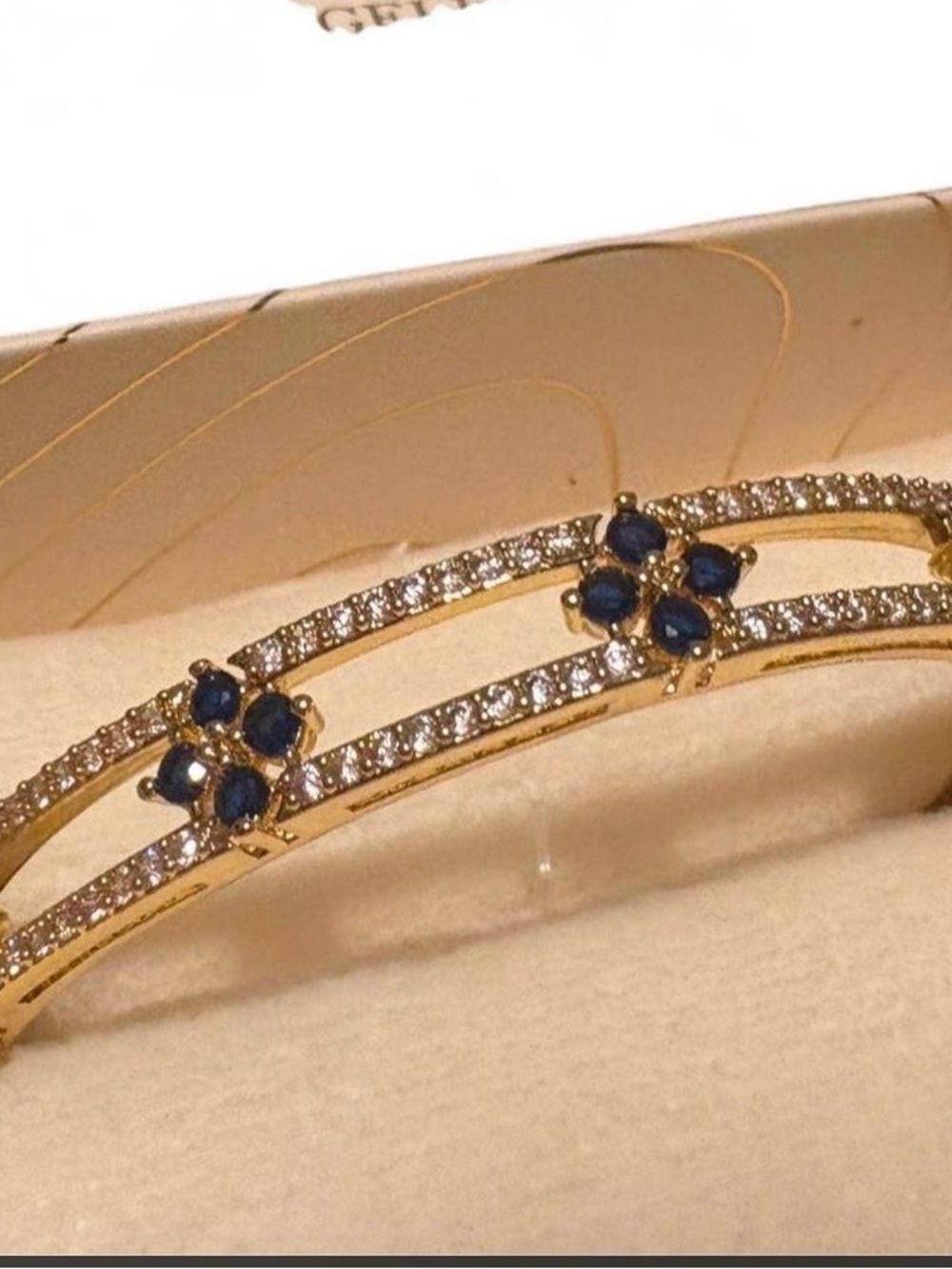 Eye Candy Gold Brass, Cubic Zirconia, Blue Stone Hinged Bangle